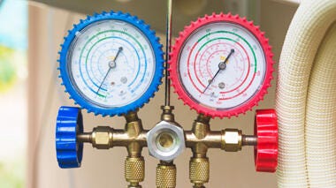 Blue and red pressure gauges