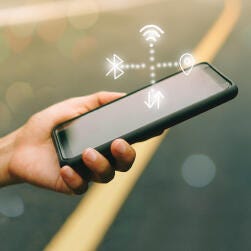 Close up of a hand holding a mobile phone