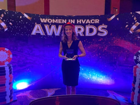 Copeland's Brandy Powell with her Top Women in HVACR Award at the 2025 Women in HVACR Award Ceremony in Las Vegas, Nevada.