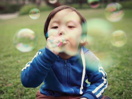 Clean China - Boy Blowing Bubbles