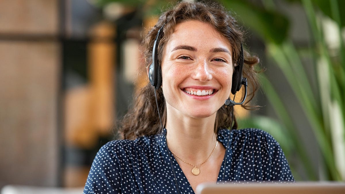 Smiling female customer service agent