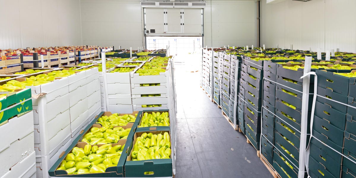 Peppers and Apples in Crates Storage Warehouse