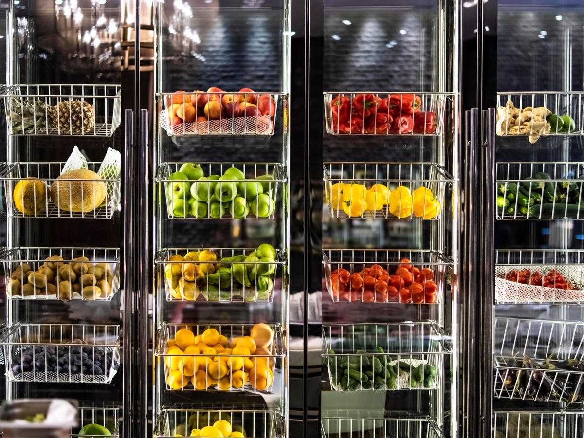 Plenty fruits and vegetables in refrigerator in restaurant