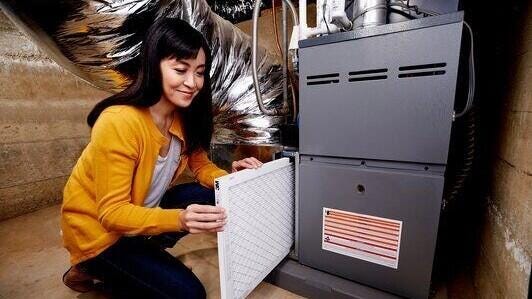 changing furnace filter changing furnace filter