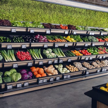 Line of Fresh Vegetables in Store
