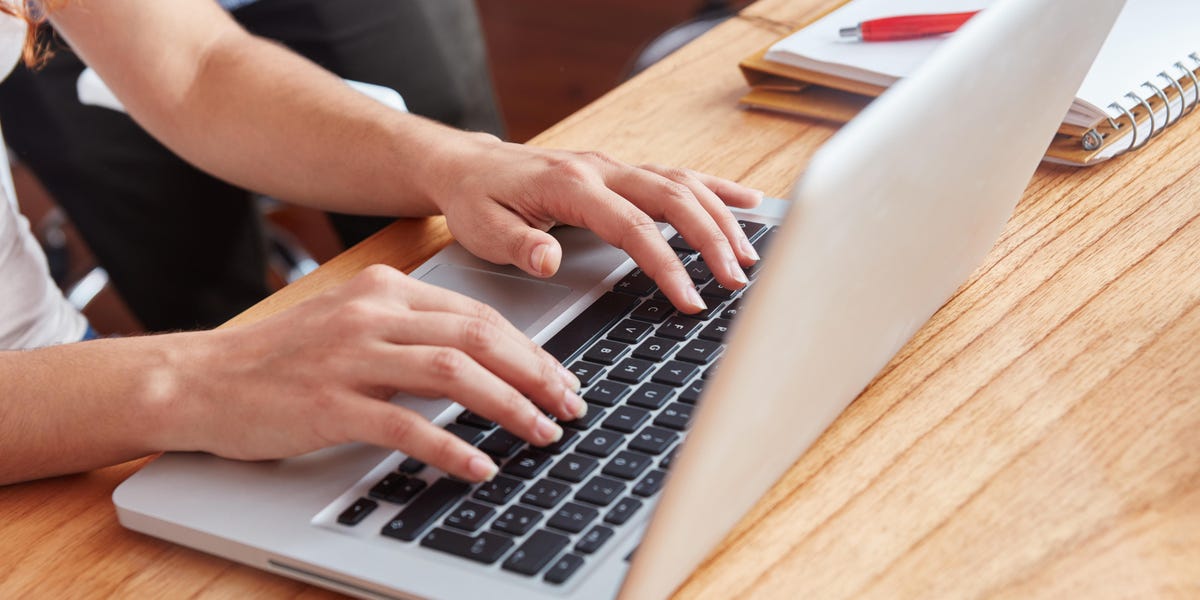 Close up of typing on keyboard