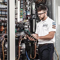 Engineer checking the HVAVR system